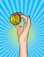 Vector retro illustration pop art comic style of a woman`s hand holding a golden coin.