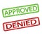 Vector rubber stamps approved and denied. Isolated. Textured.