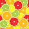 Vector seamless background of lemon, orange, lime, grapefruit slices.