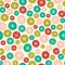 Vector seamless background pattern of bright Christmas circles and stars. A surface pattern design background ideal for