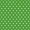 Vector seamless background with polka dot ornament made in green traditional Merry Christmas color