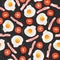 Vector, seamless breakfast pattern: fried eggs, bacon, tomatoes. Colorful, juicy background.