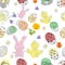 Vector seamless easter background. Easter eggs, rabbit, chick and beautiful flowers