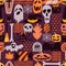 Vector seamless Halloween pattern with hand drawn doodle pumpkin, skull, witch hat, bones, candies, spider, ghost, broom