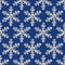 Vector seamless holiday pattern with silver glitter snowflakes.