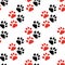 Vector seamless pattern with animal traces footprints