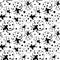 Vector seamless pattern of black contour ladybugs of different sizes. Nature-themed background and texture
