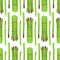 Vector seamless pattern with cartoon asparagus isolated on white.