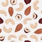 Vector seamless pattern cashew nuts, almonds, hazelnuts isolated on white