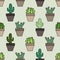 Vector seamless pattern with colorful cactuses in pots on light green background.