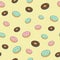 Vector seamless pattern with colorful donuts with glaze