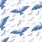 Vector seamless pattern consisting of flying birds of different sizes on a white background.