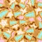 Vector seamless pattern of cookies in the form of Christmas trees and stars.