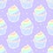 Vector seamless pattern with cupcakes with rainbow cream.