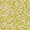Vector seamless pattern. Delicate shades of yellow color. Cute cartoon illustration of scattered buttons
