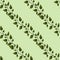 Vector seamless pattern with diagonal green foliate twigs.