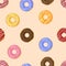 Vector seamless pattern, DONUTS, colorful different donuts on pink background.