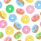 Vector seamless pattern of Doughnuts with blue, pink, green, yellow glaze and sugar icing on white