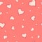 The vector seamless pattern of the heart on pastel pink grunge background.