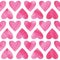 Vector seamless pattern with hearts painted by watercolor. Pinc hearts seamless pattern.