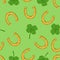 Vector Seamless Pattern of Horseshoes and Clover