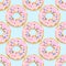 Vector seamless pattern illustration of donuts in pink glaze on a blue