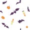 Vector seamless pattern with orange pumpkins, candles and purple bats isolated on a white background. Endless texture