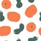 Vector seamless pattern with orange pumpkins and green squashes on white.