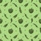 vector seamless pattern with peppers, green peas and zucchini on a green background