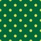 Vector seamless pattern with tennis ball on a green background. Stylish sports themes backdrop for textiles and any other design.