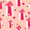 A vector seamless pattern for the valentine`s theme with gift boxes and hearts. White and pink