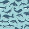 Vector seamless pattern with whale, shark, narwhal and dolphin on the polka dot blue background