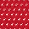 Vector seamless red christmas deer pattern. Festive repeatable xmas textile or wrapping background. Trendy holiday print