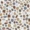 Vector seamless terrazzo pattern in brawn, gray on white background.
