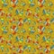 Vector seamless texture with bright autumn leaves on a mustard background