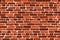 Vector seamless texture of brown realistic old brick wall with shadows