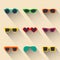 Vector set of icons of different shapes glasses in trendy flat style with long shadows effect.