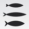 Vector set of stylized fish. Marine life. A collection of black fish silhouettes. Icon.