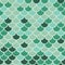 Vector shades of green multicolor mermaid fish scale seamless pattern background.