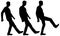 Vector silhouette of three men in profile. They make a kick and a dirty kick