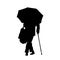 Vector silhouette of a walking elderly woman with a bag, an umbrella and a cane.