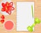 Vector strawberries, strawberry juice, weight and notebook on wood background.