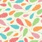 Vector tossed colourful feathers seamless repeat pattern background.