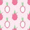 Vector tropical seamless pattern with dragon fruit on the pink dotted background. Hand drawn
