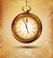 Vector vintage pocket watch on an old grunge background