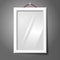 Vector white isolated vertical photo frame hanging