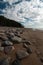 Veczemju Klintis - Boulder beach in Baltic country Latvia in April 2019 - Cloudy sky with dull clouds and a bit of sun