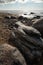 Veczemju Klintis - Boulder beach in Baltic country Latvia in April 2019 - Cloudy sky with dull clouds and a bit of sun