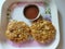 Veg cutlets in a plate. Cabbage cutlets receipe served in a plate. Indian receipe veg cutlet close up view.