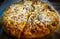 Veg pizza with cheese, corn and vegetables, food ingredients, recipe photography, street food background